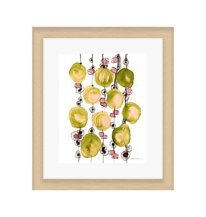 Framed artwork of colorful abstract design on a white background in a light wood frame