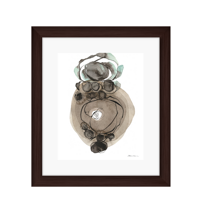 Framed abstract art piece with brown frame on a white background